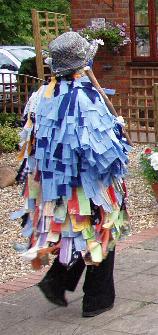 very long coat, wide tatters